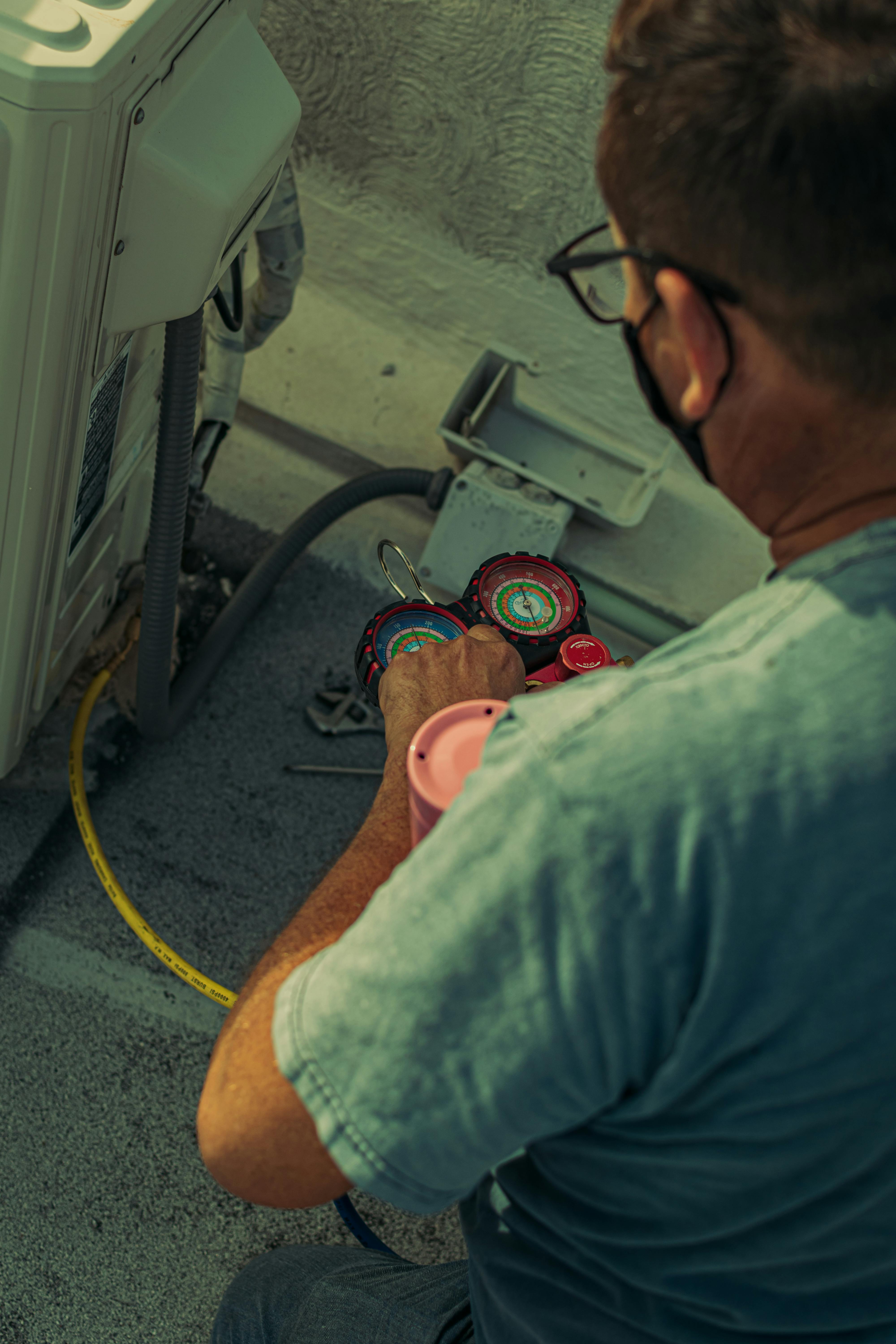 Professional HVAC technician working on equipment in Austin